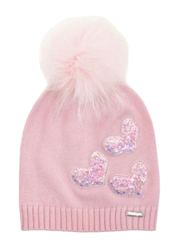 Pink hat with pompom and hearts on the side